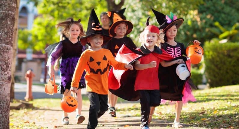 Group of children in Halloween costumes