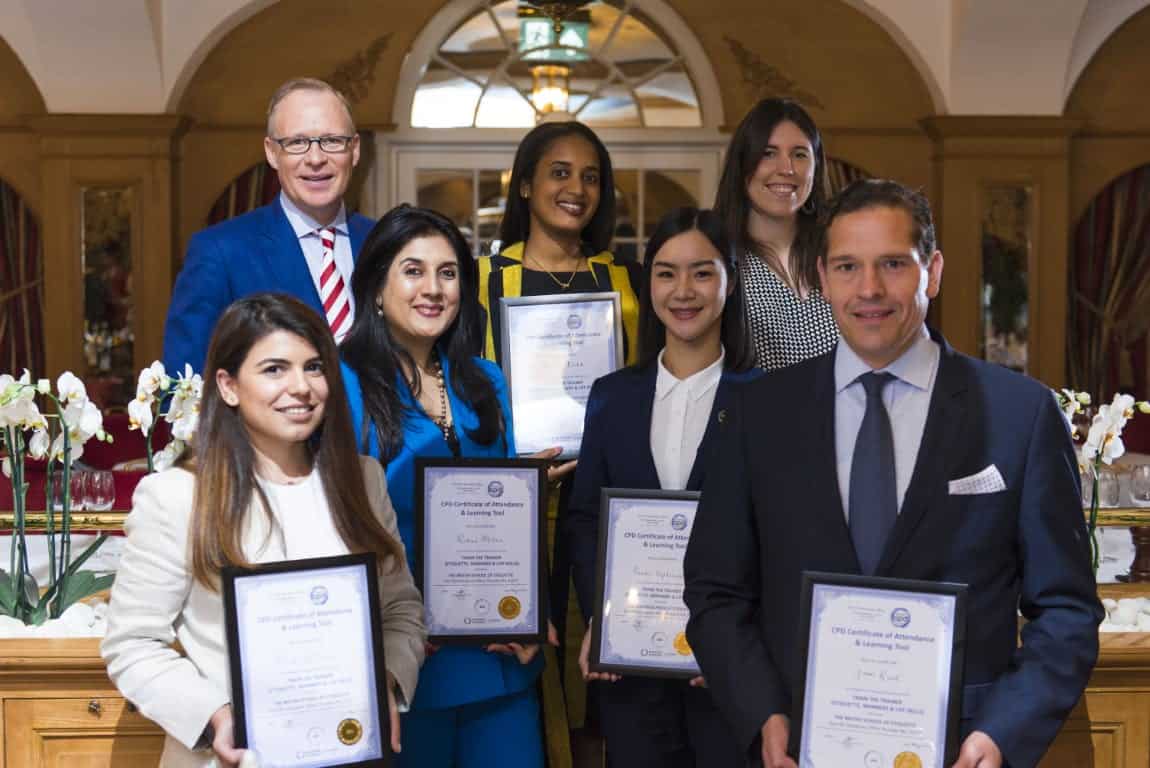 Group of TTT students proudly displaying their certificates